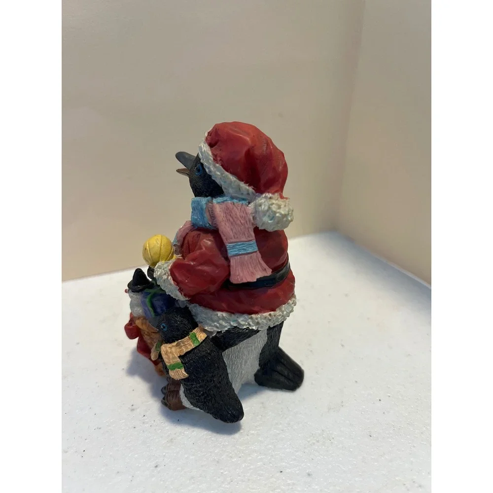 Christmas Santa Penguin Figurine with Baby Penguin and Holiday Sack Resin Decor